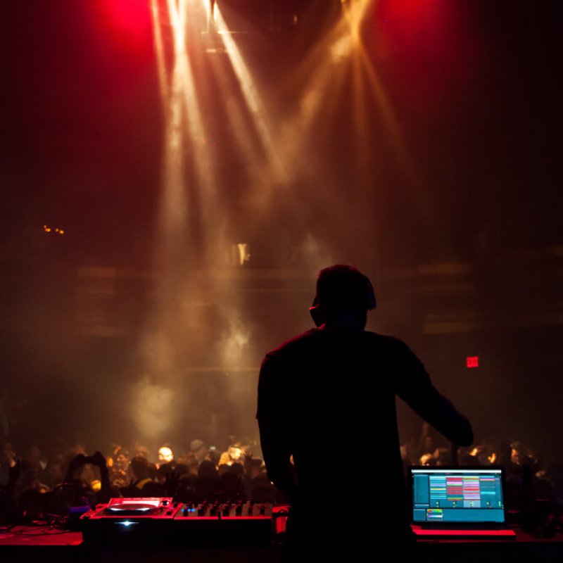 A,Dj,Performing,At,A,Concert